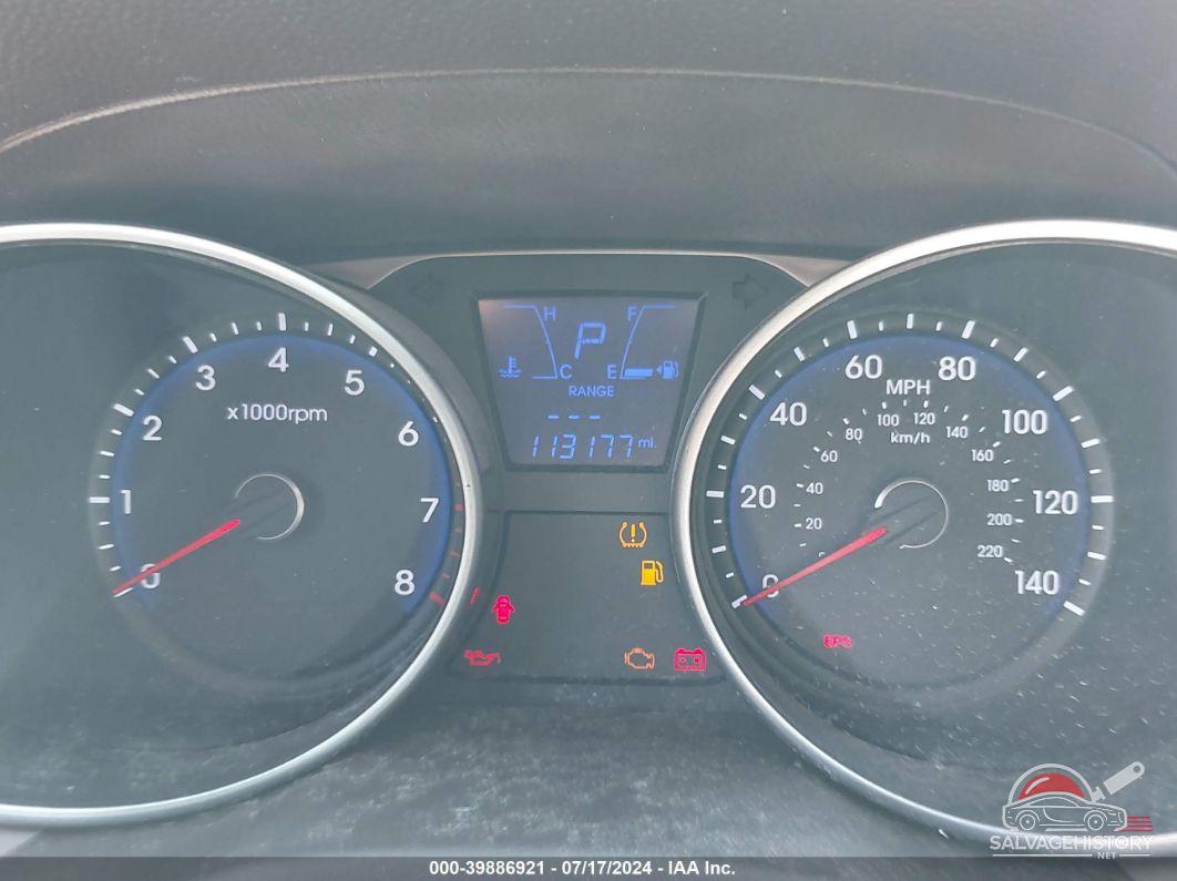 KM8JUCAC4CU381346 2012 HYUNDAI TUCSON photo no. 7