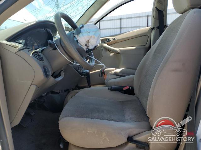 1FAFP34Z94W195315 2004 FORD FOCUS photo no. 7