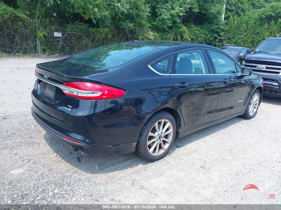 3FA6P0LU0HR164113 2017 FORD FUSION HYBRID photo no. 4