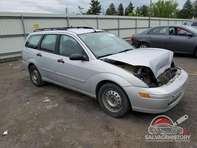 1FAFP36334W137483 2004 FORD FOCUS photo no. 4