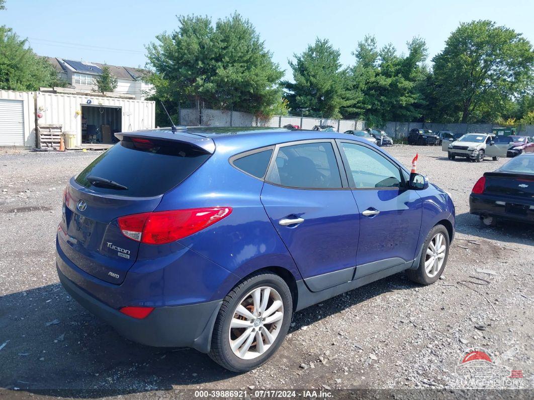 KM8JUCAC4CU381346 2012 HYUNDAI TUCSON photo no. 4