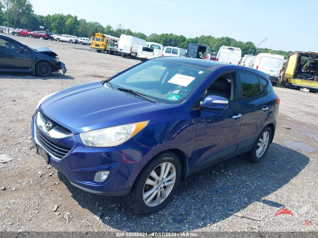 KM8JUCAC4CU381346 2012 HYUNDAI TUCSON photo no. 2