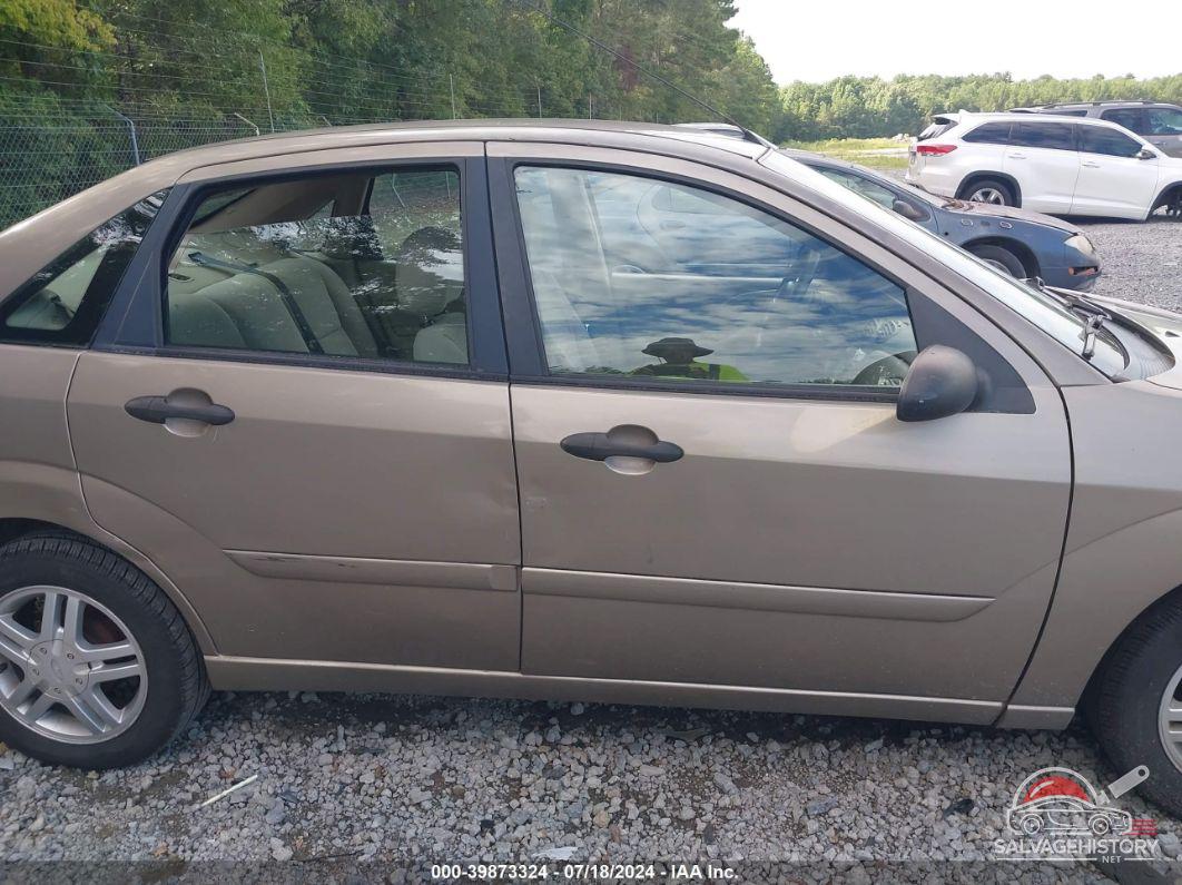 1FAFP34Z34W180924 2004 FORD FOCUS photo no. 6