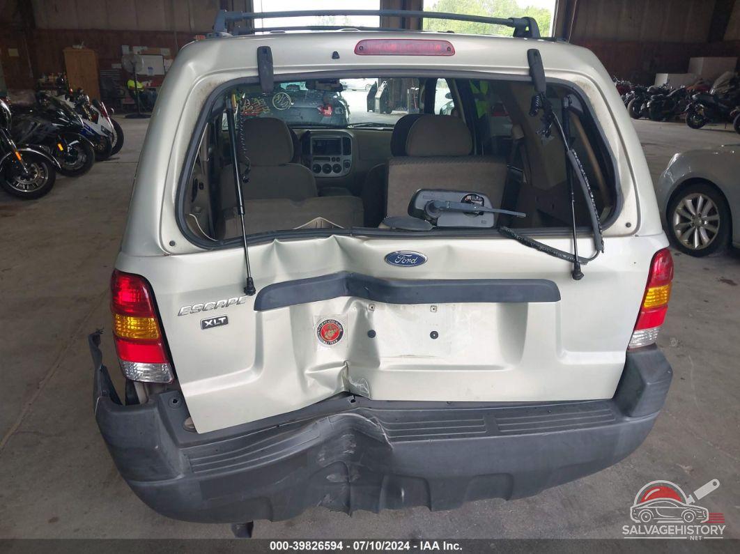 1FMYU93104KA25101 2004 FORD ESCAPE photo no. 6