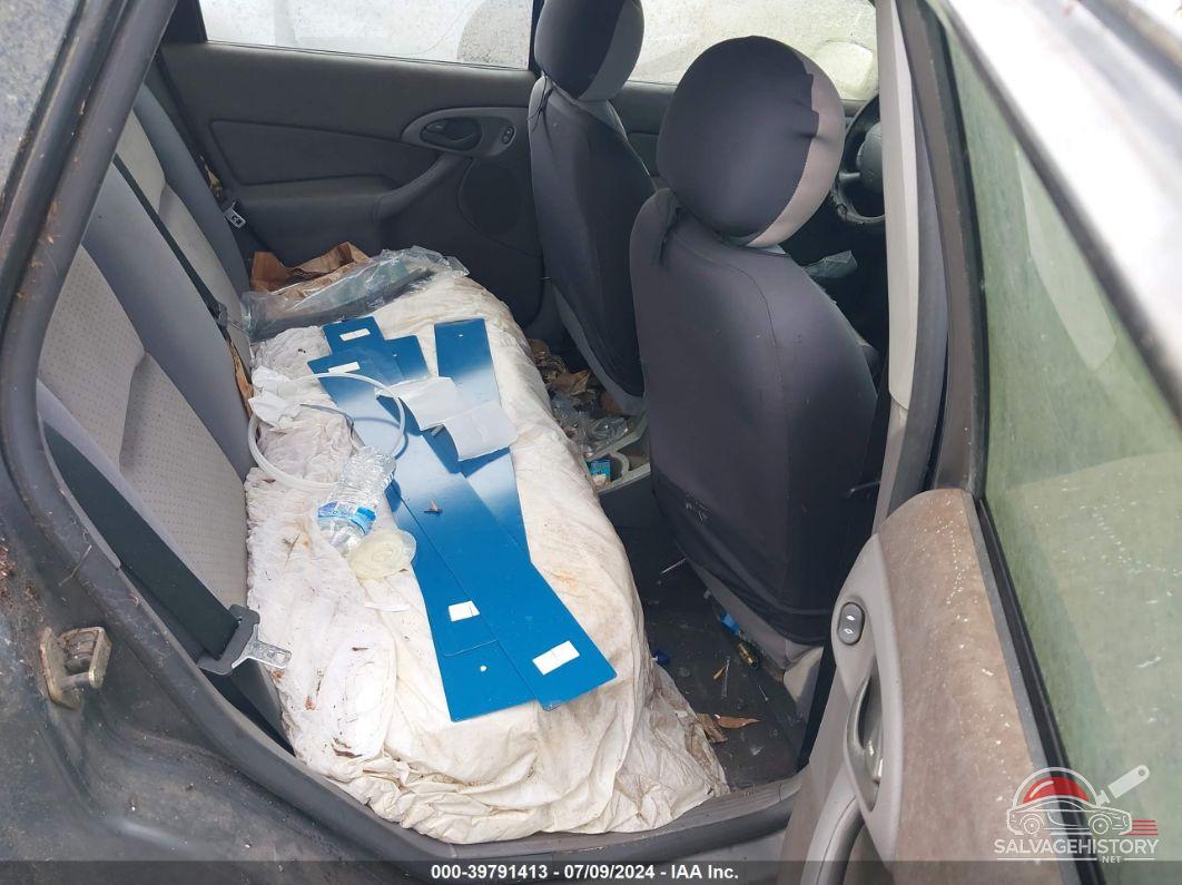 1FAFP38Z54W130147 2004 FORD FOCUS photo no. 8