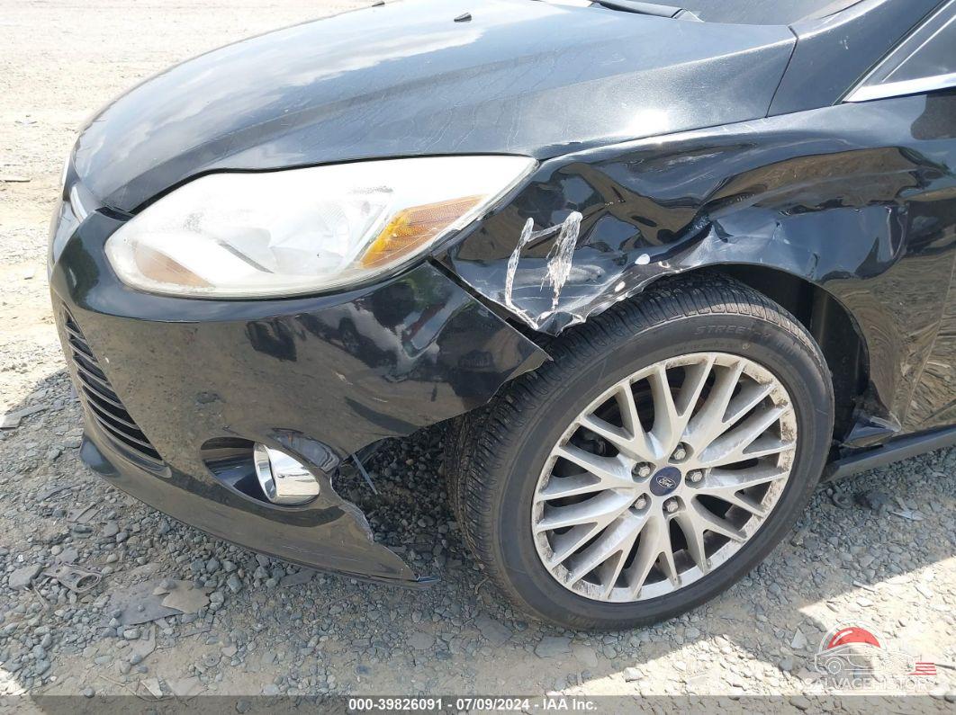 1FAHP3H28CL339782 2012 FORD FOCUS photo no. 6