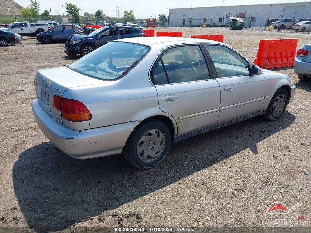 JHMEJ864XVS004255 1997 HONDA CIVIC photo no. 4