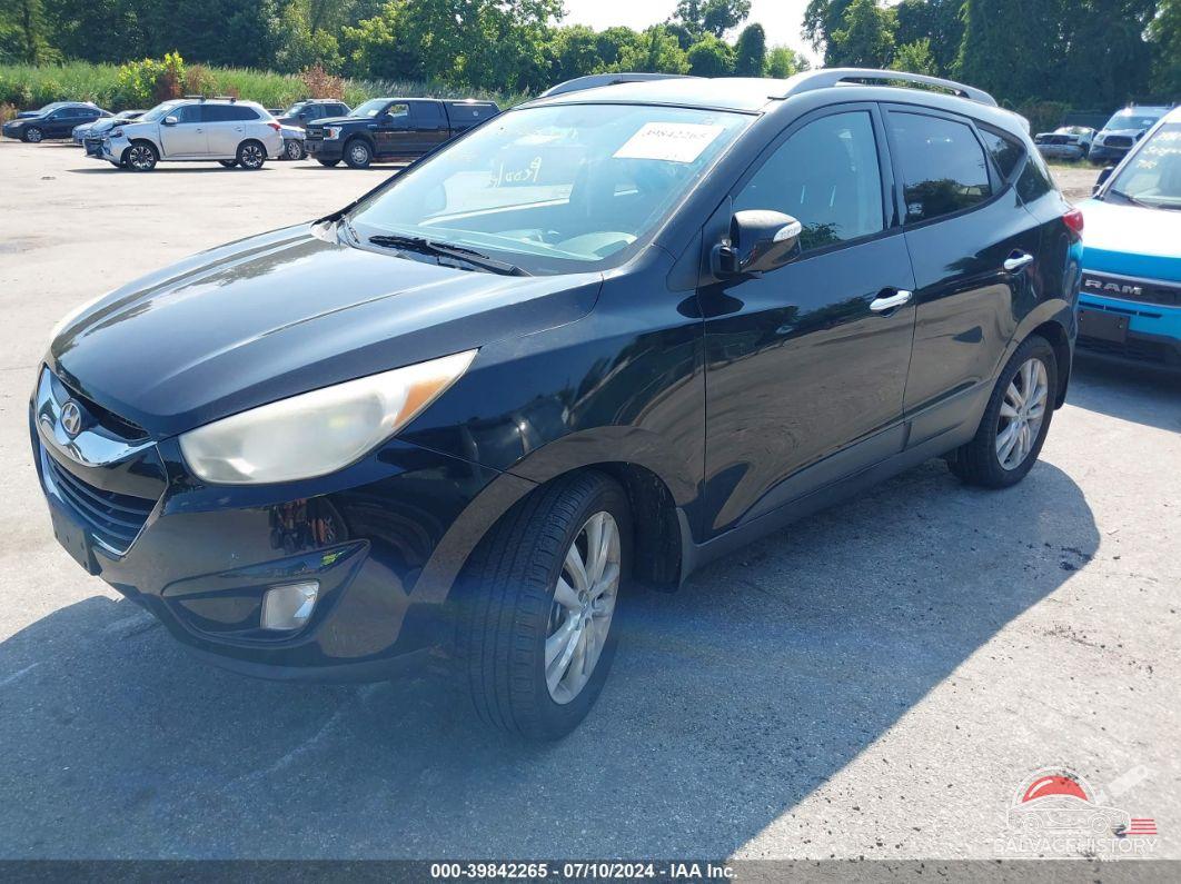 KM8JUCAC0CU381649 2012 HYUNDAI TUCSON photo no. 2