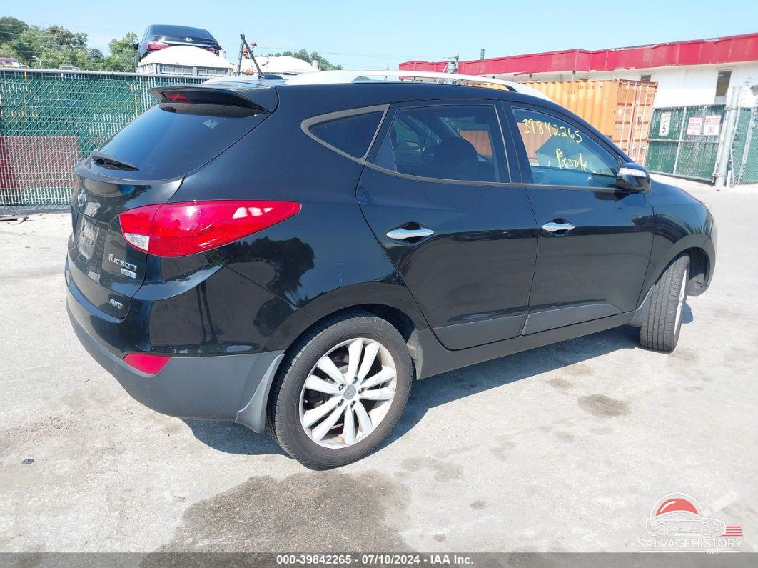 KM8JUCAC0CU381649 2012 HYUNDAI TUCSON photo no. 4