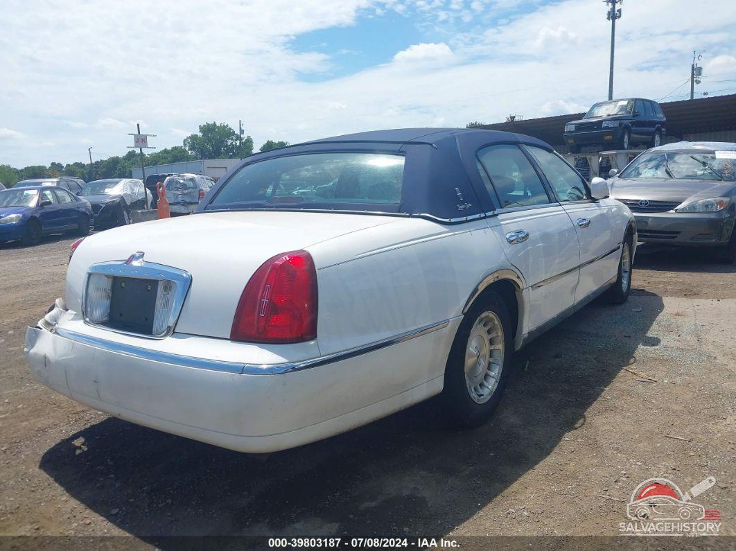 1LNHM81W0XY716610 1999 LINCOLN TOWN CAR photo no. 4