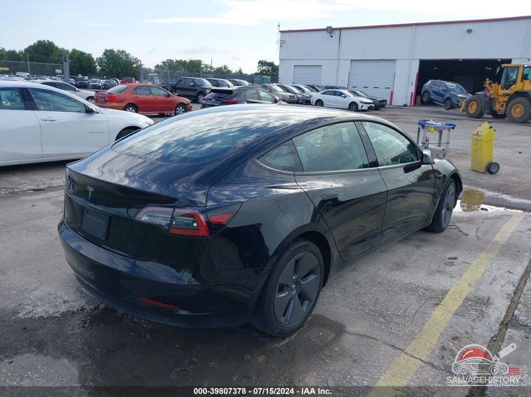 5YJ3E1EA0PF397050 2023 TESLA MODEL 3 photo no. 4
